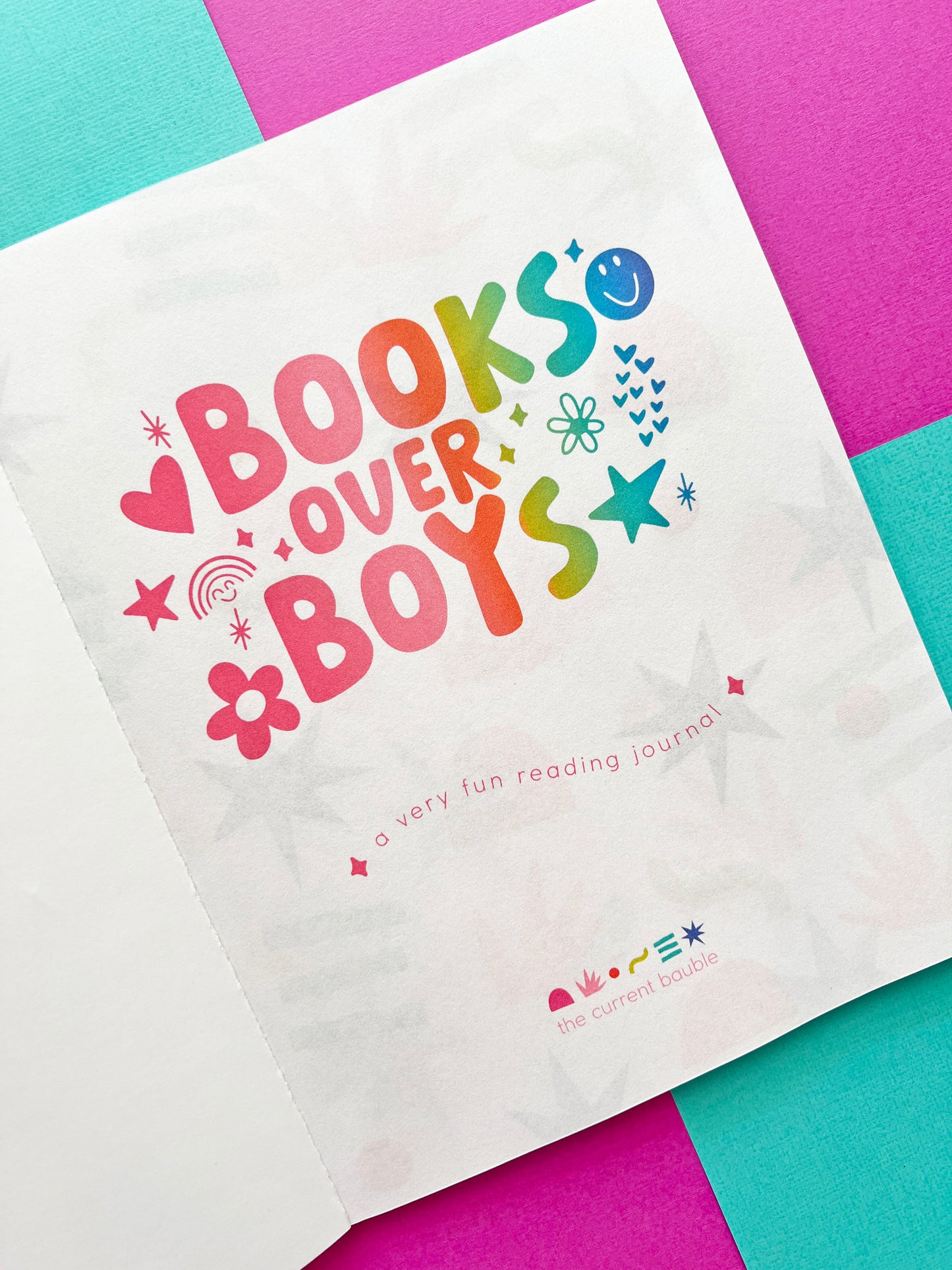 Inside title page of the Books Over Boys kids reading journal, featuring rainbow lettering and playful doodles. A creative and empowering reading log for girls to spark a love of books and reading confidence.