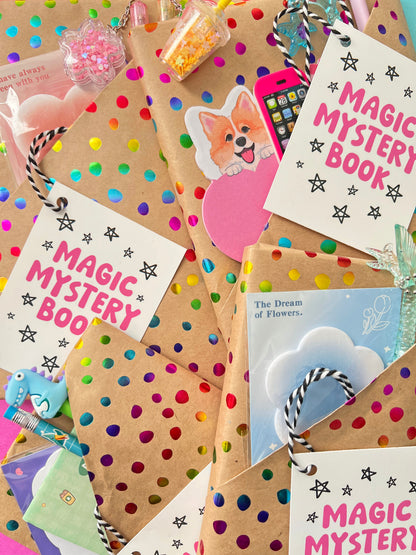 Surprise mystery book gift packages for kids featuring colorful metallic polka dots, flower sticky notes, and charms.