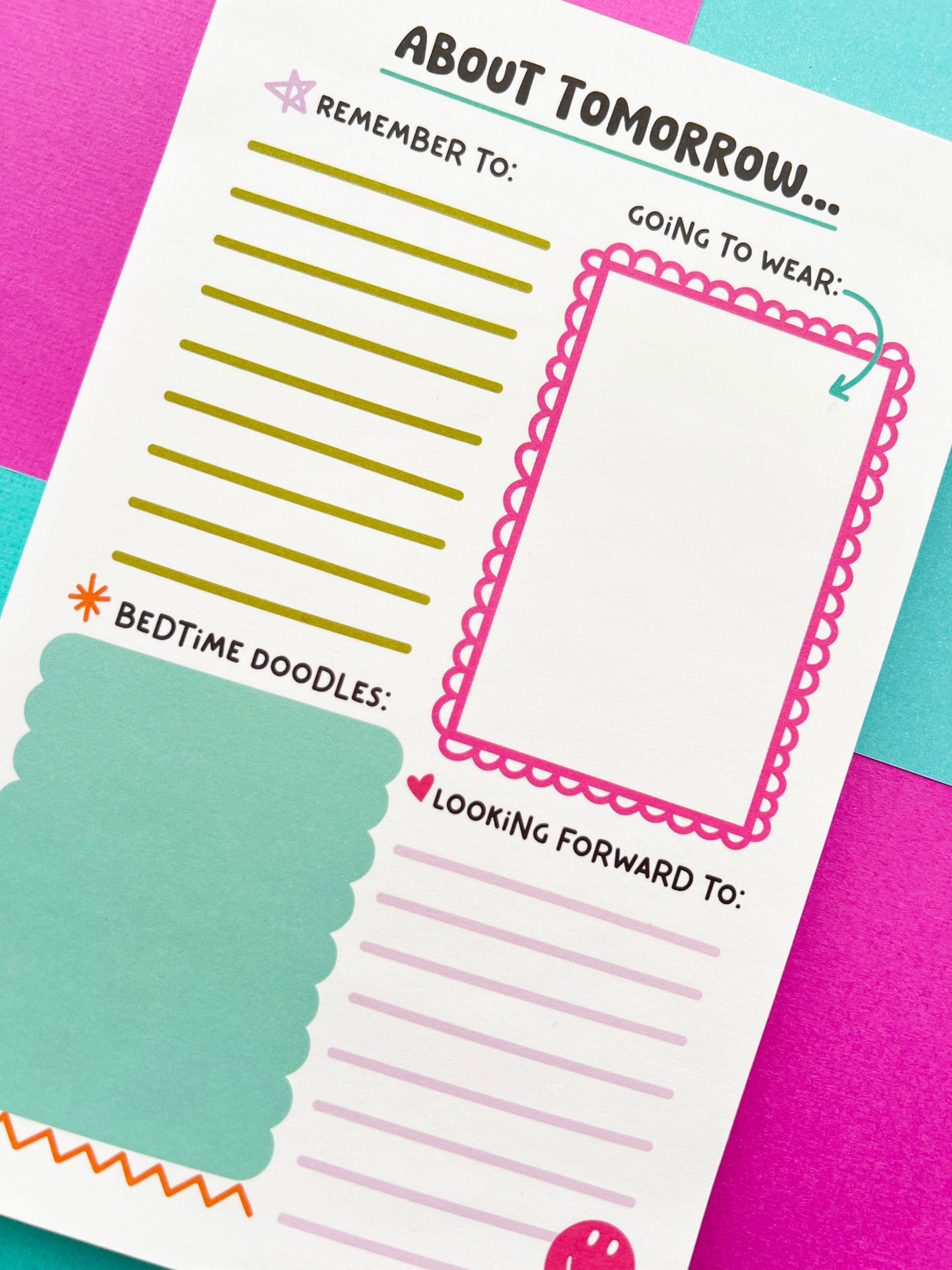Close-up of the About Tomorrow kids bedtime routine notepad showing reminder list, outfit planning box, doodle section, and looking-forward-to prompts. Children’s nightly planning pad to ease bedtime anxiety and support smoother morning routines.