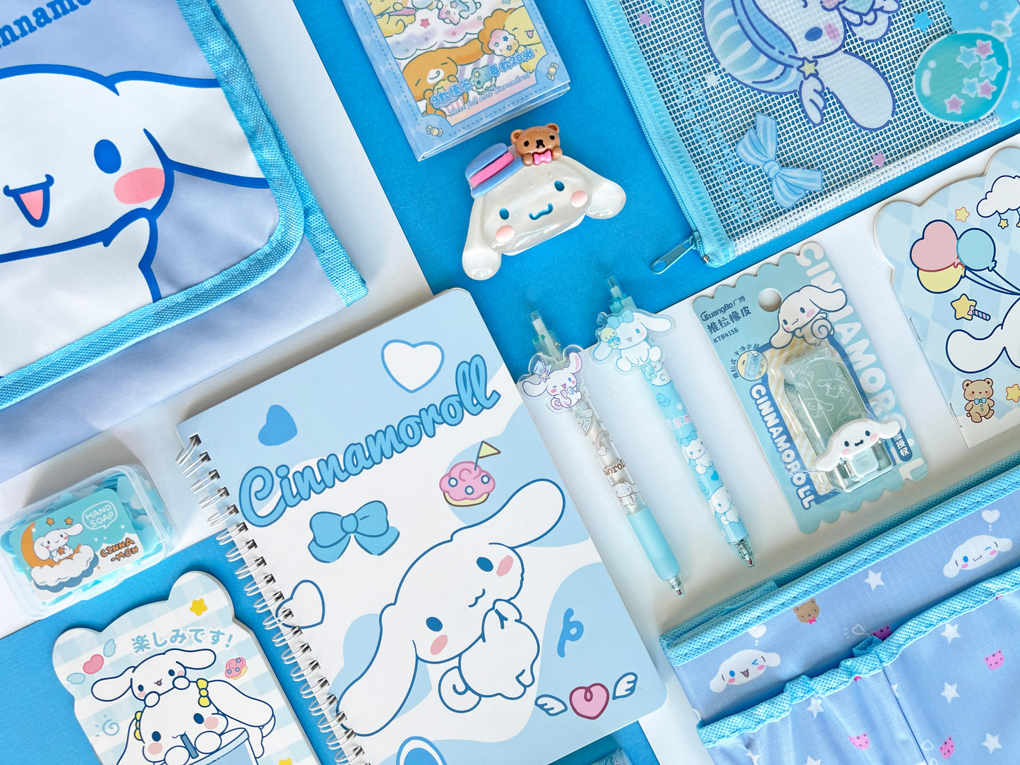 Blue cartoon puppy theme stationery mystery box set featuring a spiral notebook, pens, pouch, and desk accessories.