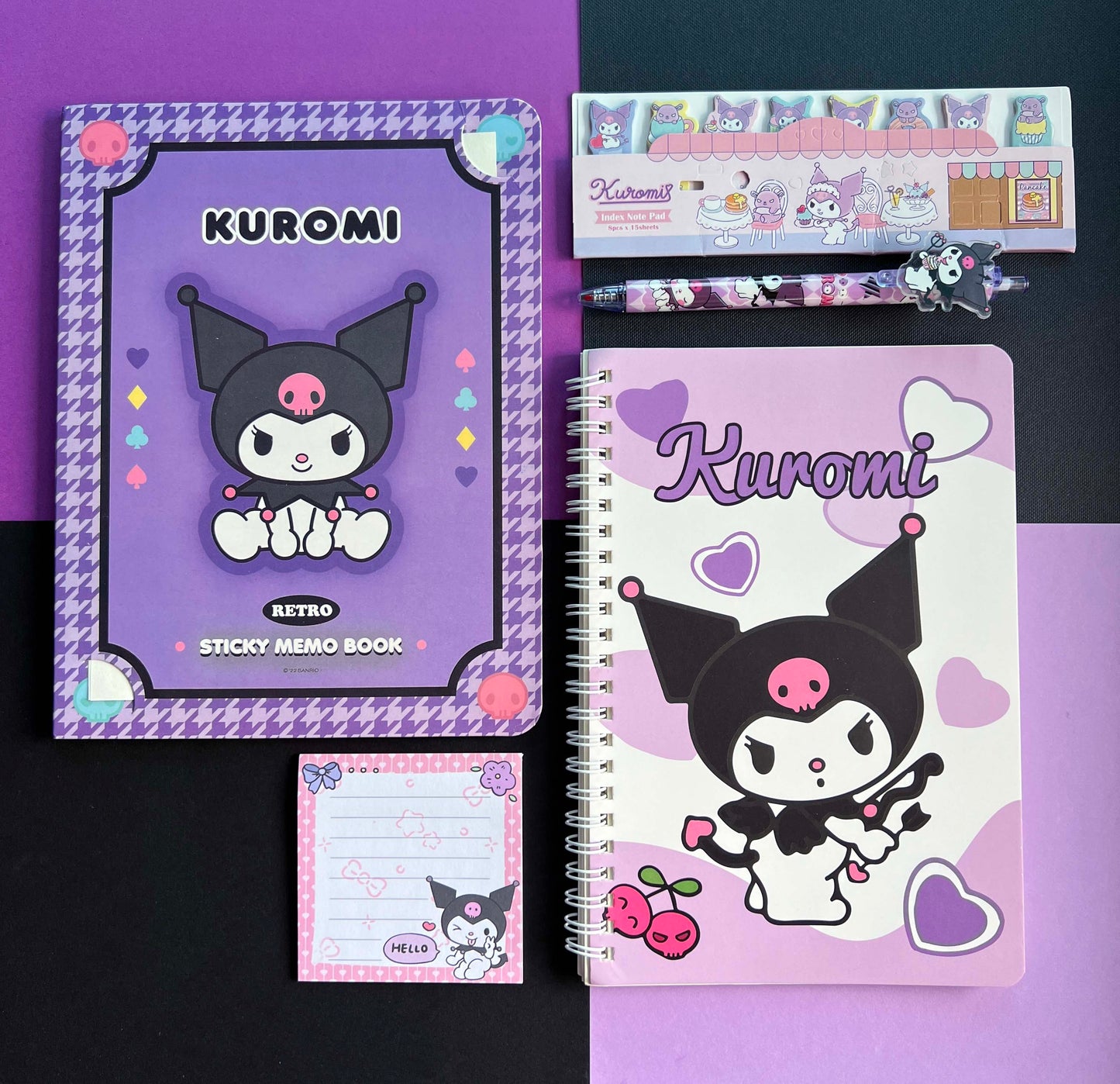 Purple and black cartoon character stationery collection featuring character notebooks, a memo pad, and aesthetic gel pens.