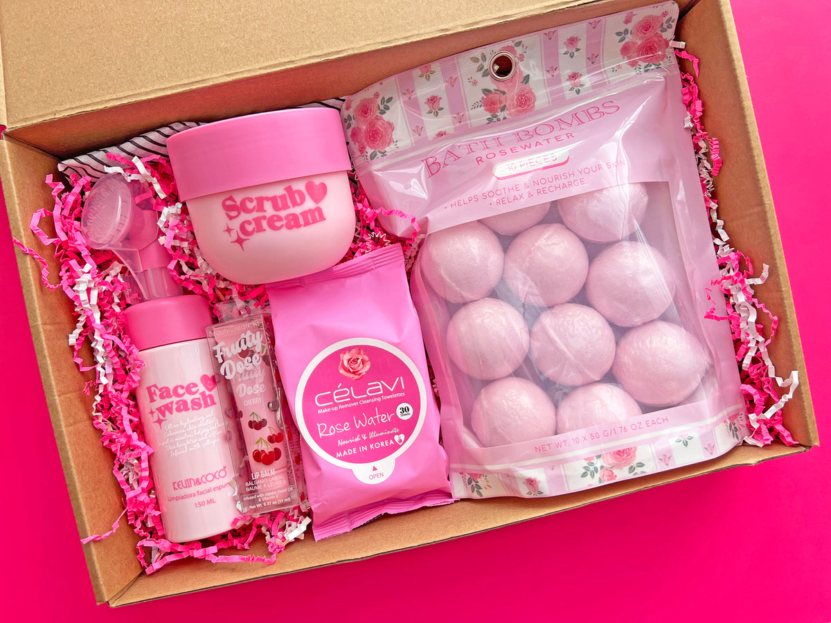 Self care mystery bundle for girls featuring pink bath bombs, face wash, scrub cream, and face wipes.
